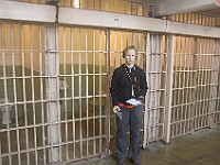 DSC 2015  Teagan beside a jail cell : Alcatraz, flowers, prison